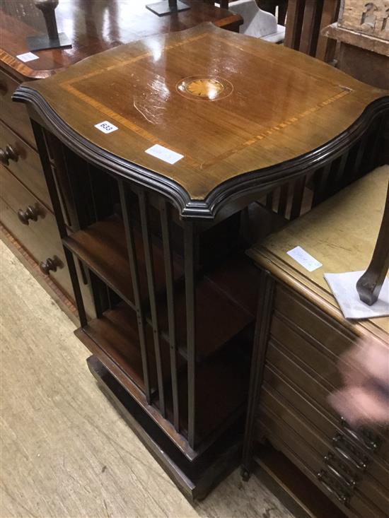 An Edwardian inlaid mahogany revolving bookcase